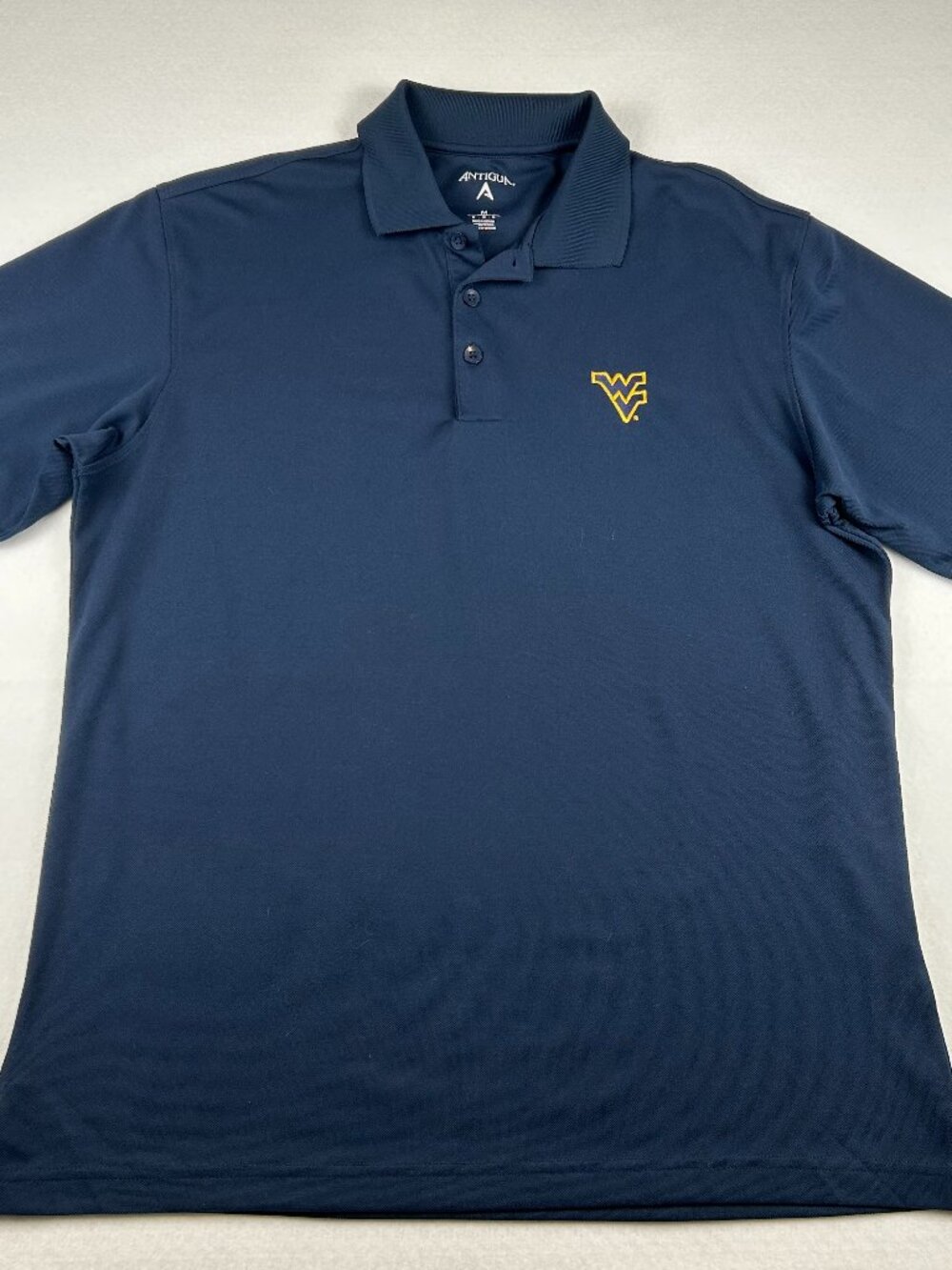 WEST VIRGINIA UNIVERSITY MOUNTAINEERS | Men's Antigua Polo Shirt, size M